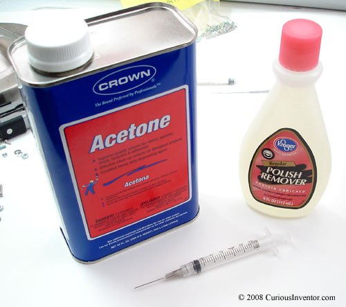 Tools for joining acrylic: acetone and a syringe