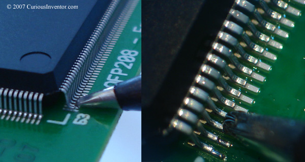 Hand soldering the first side of a fine pitch QFP surface mount chip.